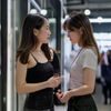 丝袜妈妈首席产品官刘思远的专业形象照，在产品展示区前认真审查新款丝袜样品，体现对产品品质的严格把控态度